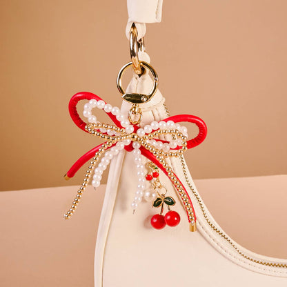 🎀 Cherry Bliss Layered Bows Bag Charm – Statement Keychain Accessory